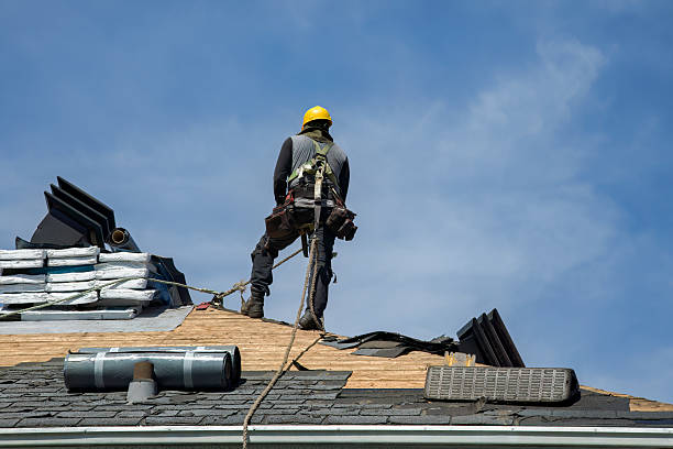 Professional Roofing technician working in Urbana, IA